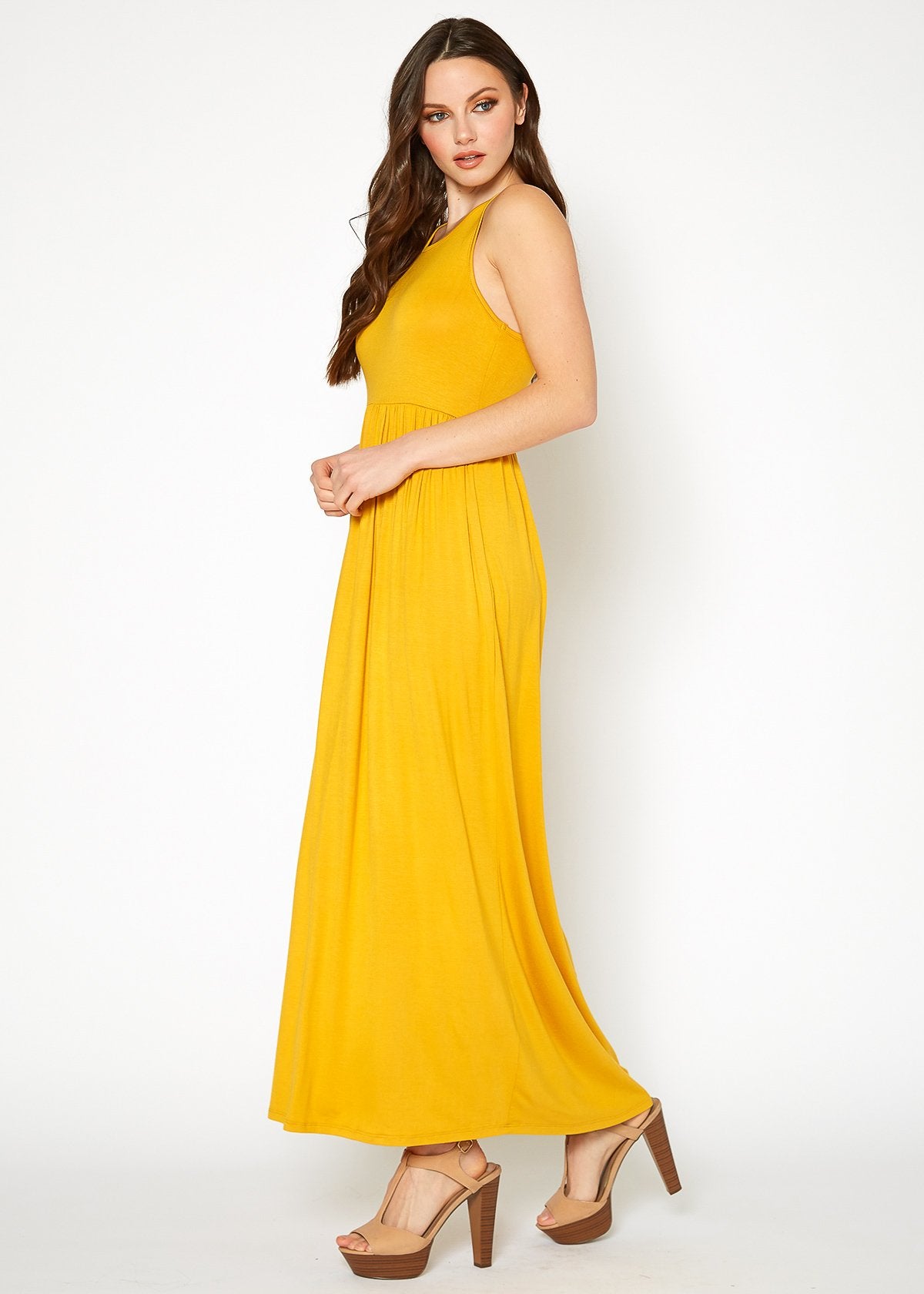 Mustard sleeveless pleated maxi dress for women by Lemon Hera, flowing fabric and elegant design.