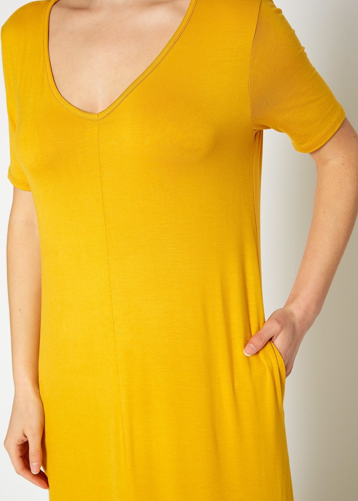 Mustard V-neck short sleeve maxi dress with pockets for women by Lemon Hera, featuring a flowing silhouette and comfortable fit.