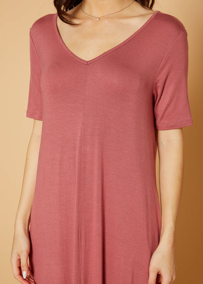 Mauve V-neck short sleeve maxi dress with pockets for women, by Lemon Hera, shown on a model.