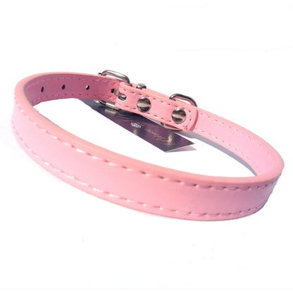 Pink Kensington plain dog collar for pets by Salmon Oscar, featuring a simple adjustable design with a smooth finish.