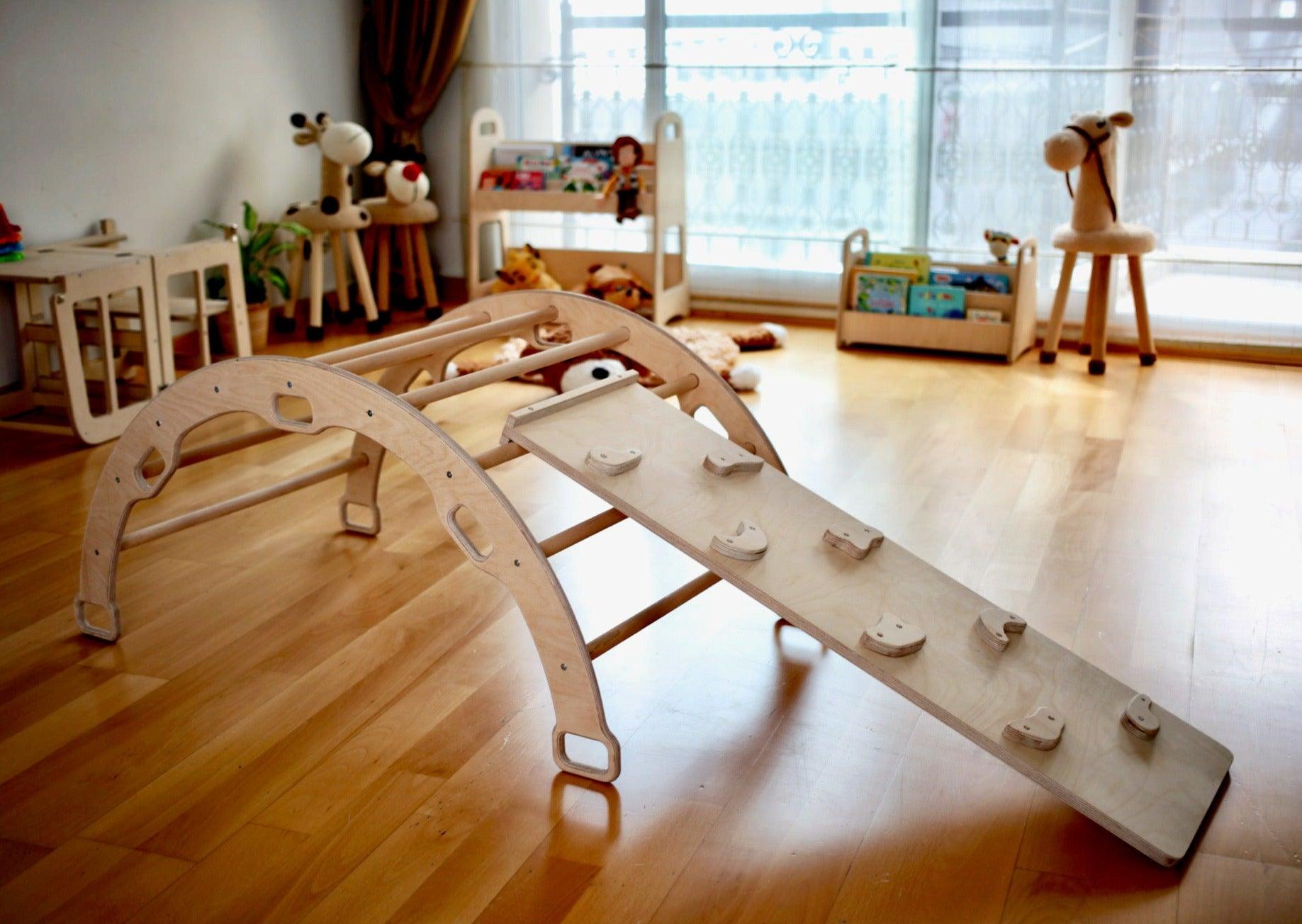 Wooden climbing arch rocker with ramps for kids, features smooth wood finish and colorful climbing surfaces, by Red Oceanus furniture.