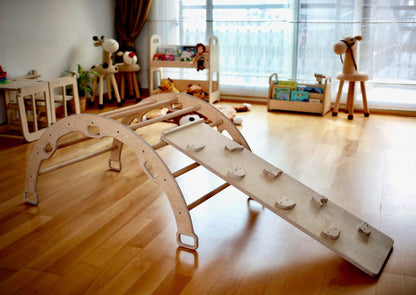 Wooden climbing arch rocker with ramps for kids, features smooth wood finish and colorful climbing surfaces, by Red Oceanus furniture.