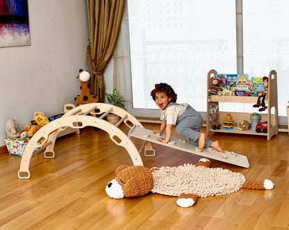 Wooden climbing arch rocker with ramps for kids, made by Red Oceanus, featuring smooth finish and natural wood construction.