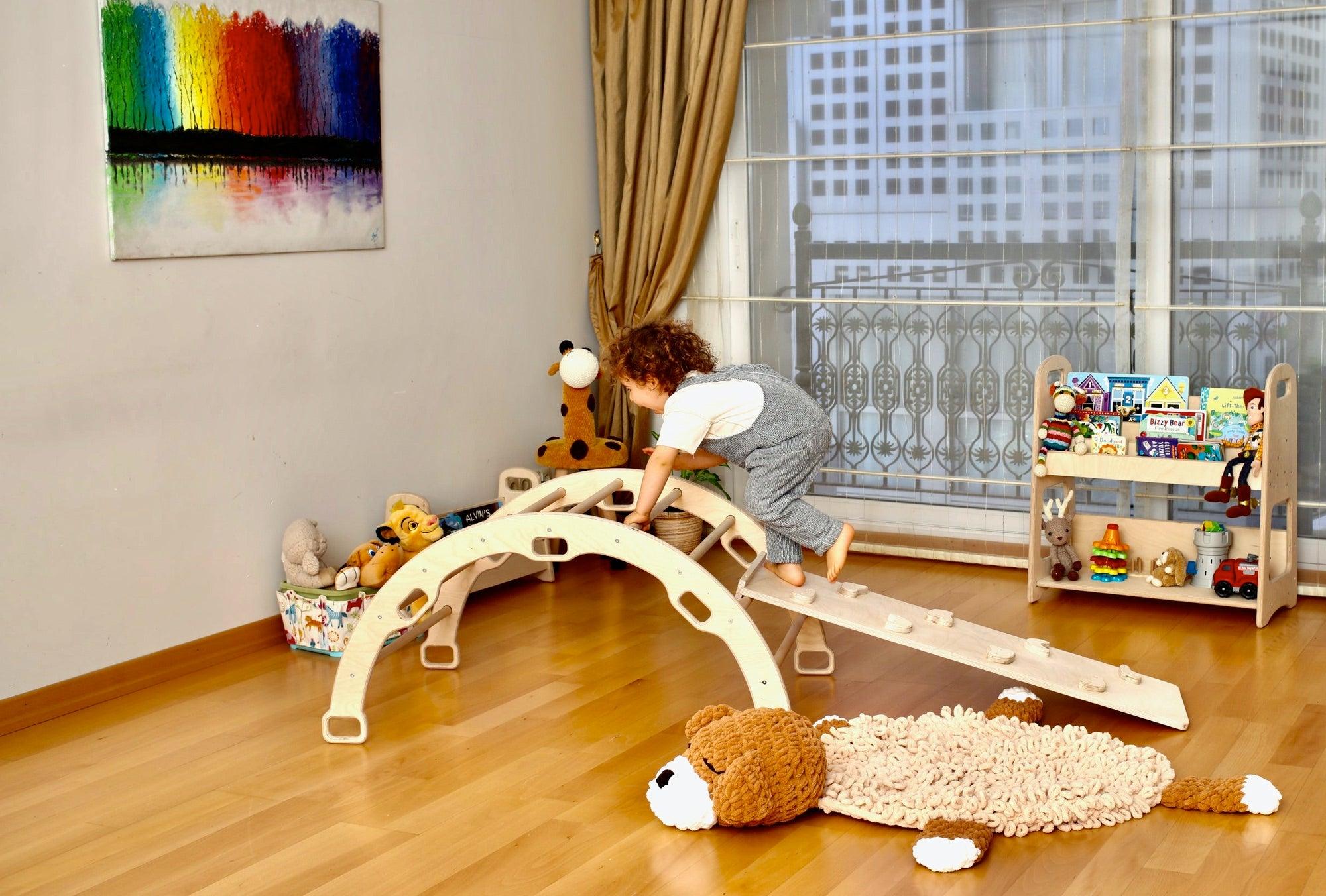 Red Oceanus wooden climbing arch rocker with ramps for kids, featuring a natural wood finish and playful design.