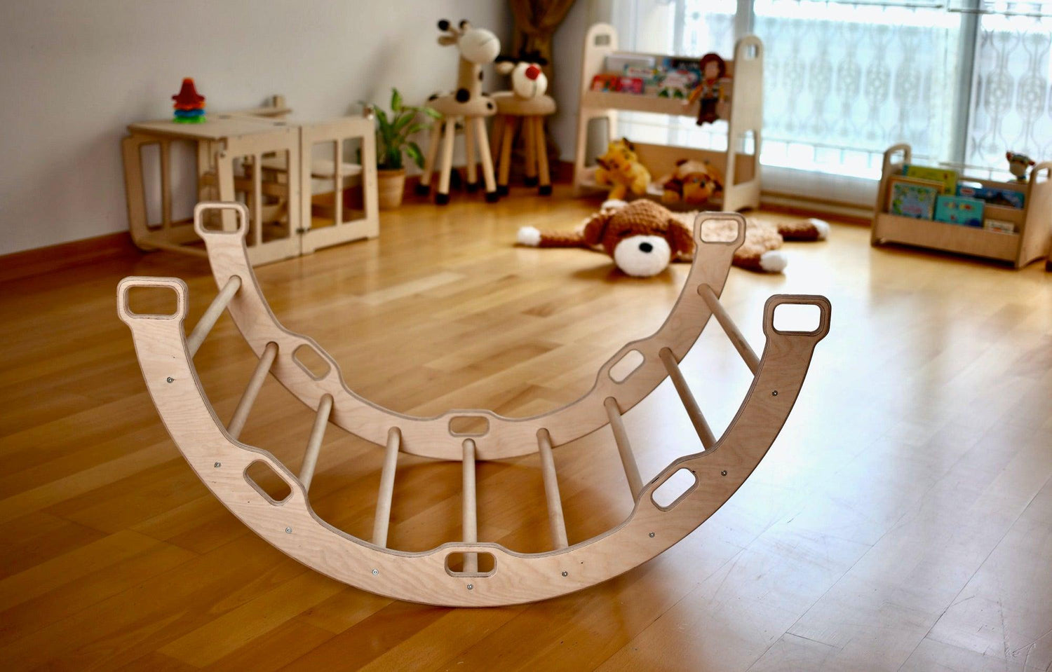 Red Oceanus Montessori climber set featuring an arch, rocker, ramp, and pillow designed for children&