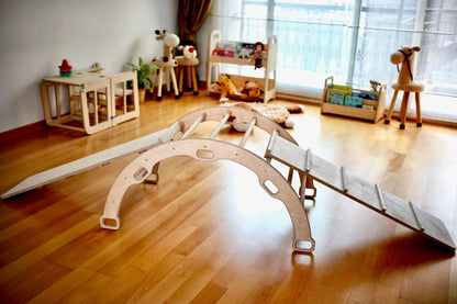 Red Oceanus Montessori climbing set with arch and rocker, child-friendly wooden furniture for active play and motor skill development.