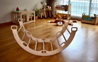 Red Oceanus climbing arch with origami pattern pillow, child-friendly furniture piece for play and sensory development.