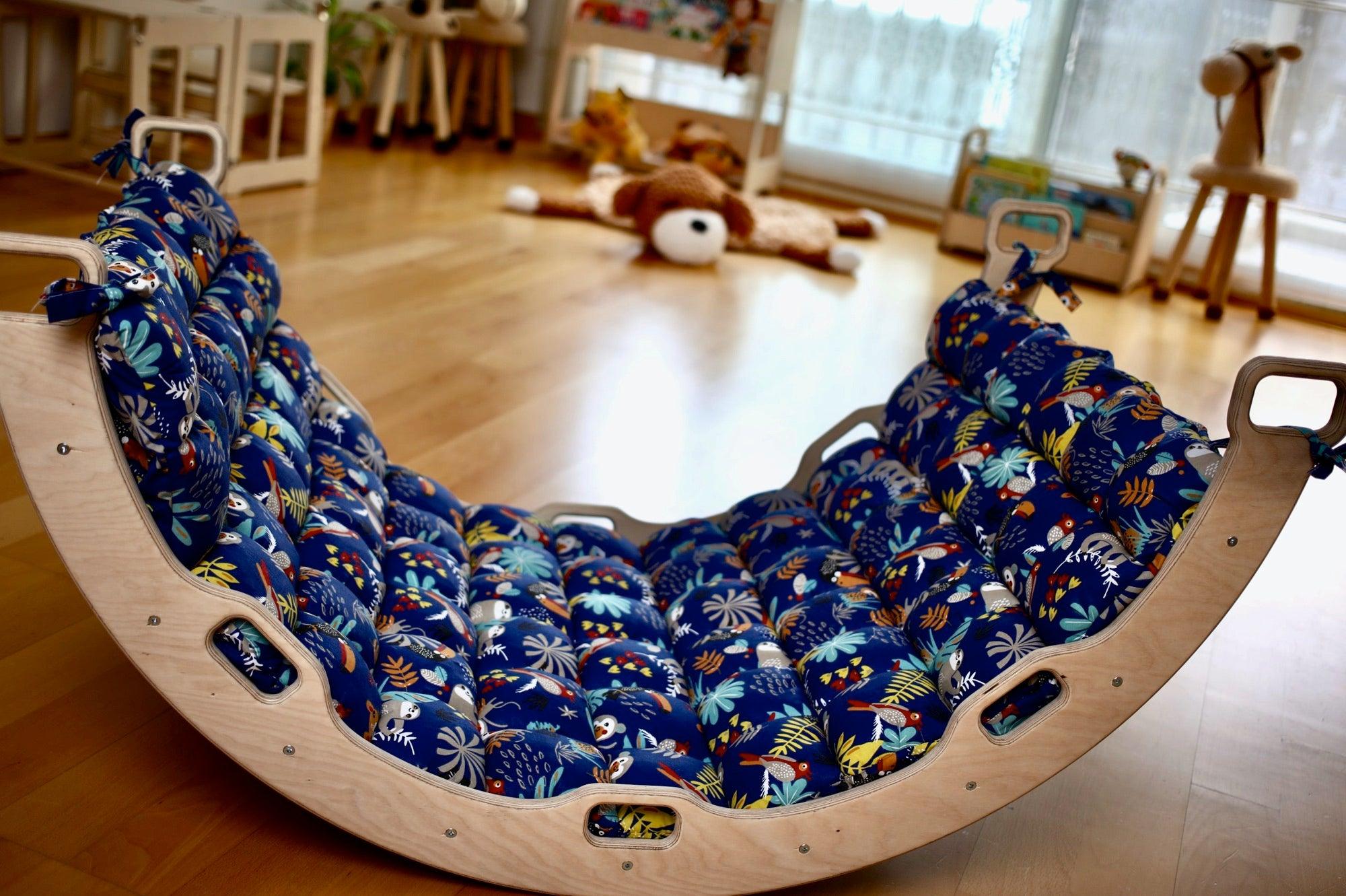 Red Oceanus climbing triangle, arch rocker, pillow, and 2-in-1 ramp set for kids, showcasing colorful, versatile furniture pieces.