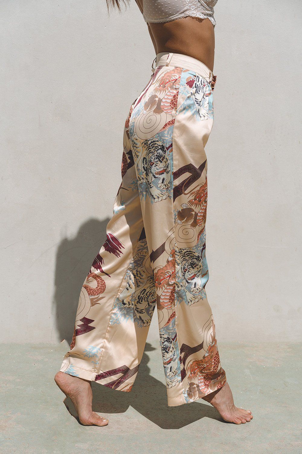 Azure Thanatos Kayda Satin Wide Leg Pants from the matching set, showcasing smooth satin fabric and relaxed fit.