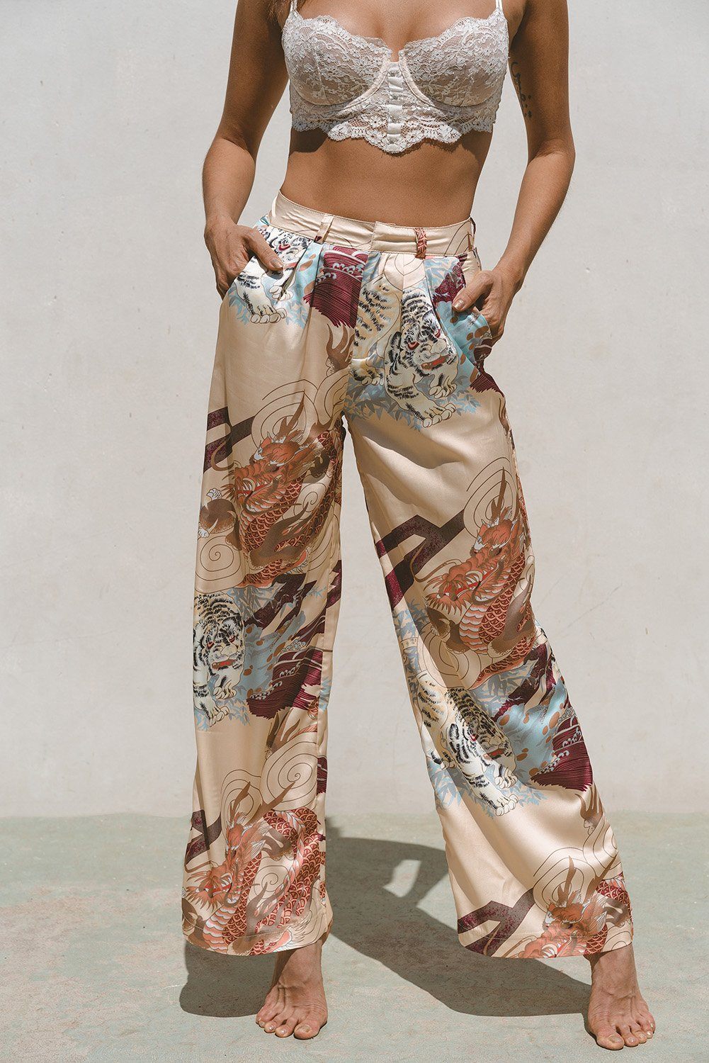 Azure Thanatos Kayda Satin Wide Leg Pants from matching sets, featuring smooth satin fabric and a flowing wide-leg design.