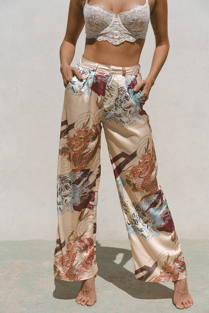 Azure Thanatos Kayda Satin Wide Leg Pants from matching sets, featuring smooth satin fabric and a flowing wide-leg design.