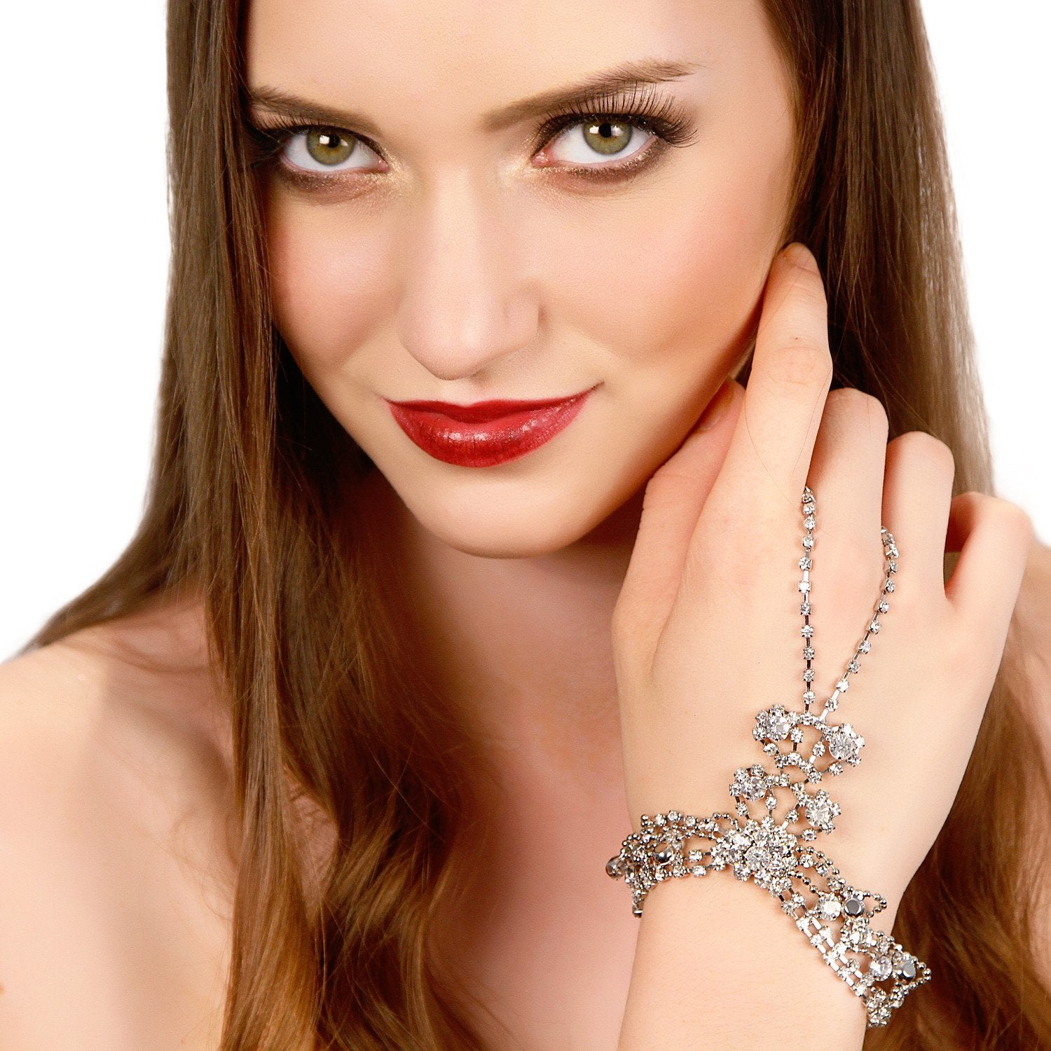 Cyan Ismene Draping Crystals Handpiece bracelet with intricate crystal draping and elegant design, worn on a person&