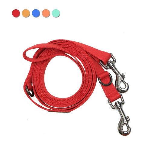 Red Lof folding lead leash for pets by Emerald Alfie, showcasing a compact, durable leash with a comfortable handle.