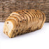 Slices of Great Low Carb Bread Company Everything Bread by Peach Oliver, showing the crust and soft interior on a cutting board.