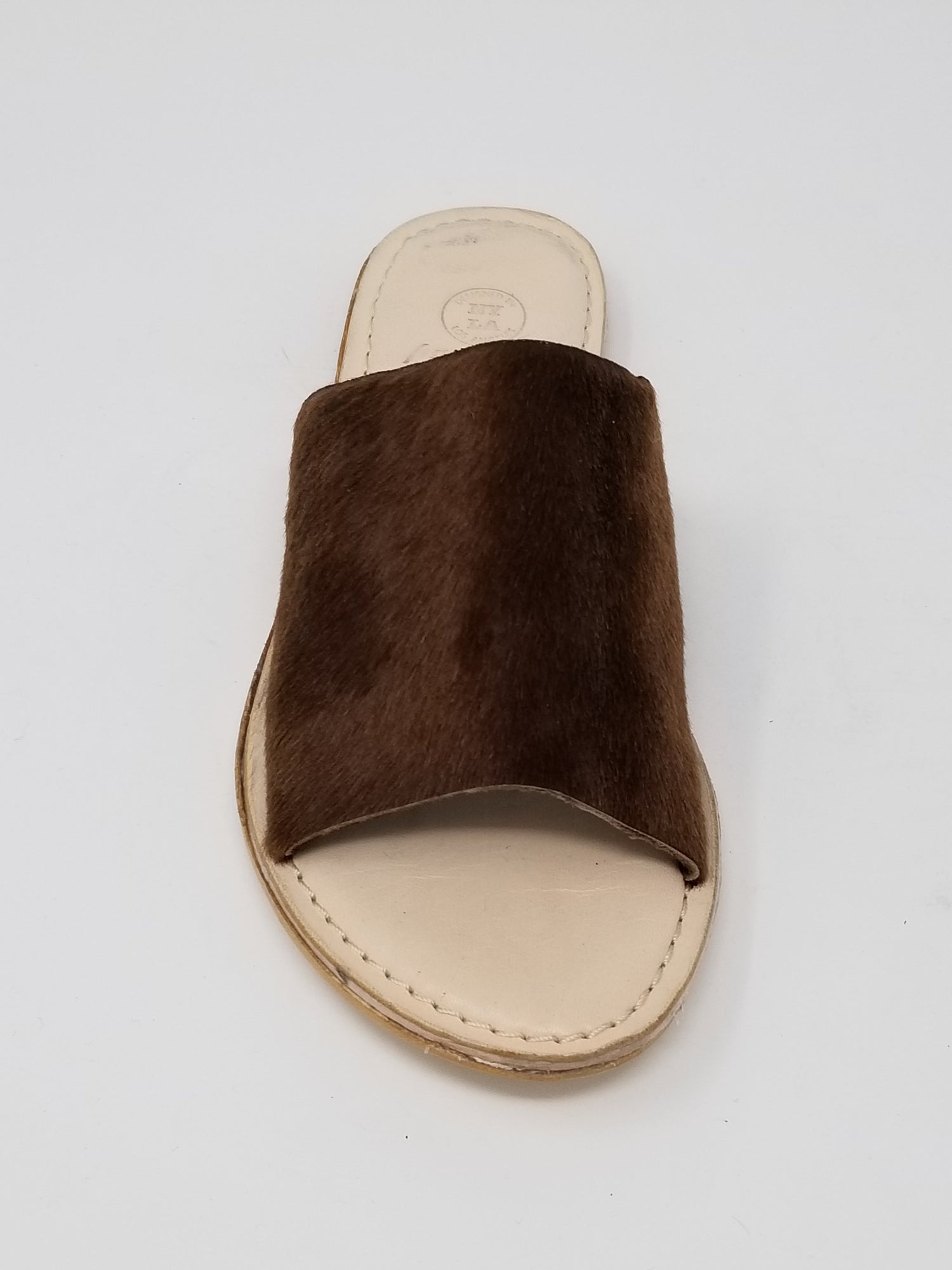Azure Ophion Laguna brown calf hair footwear front view showing stylish, textured leather design with sleek silhouette.