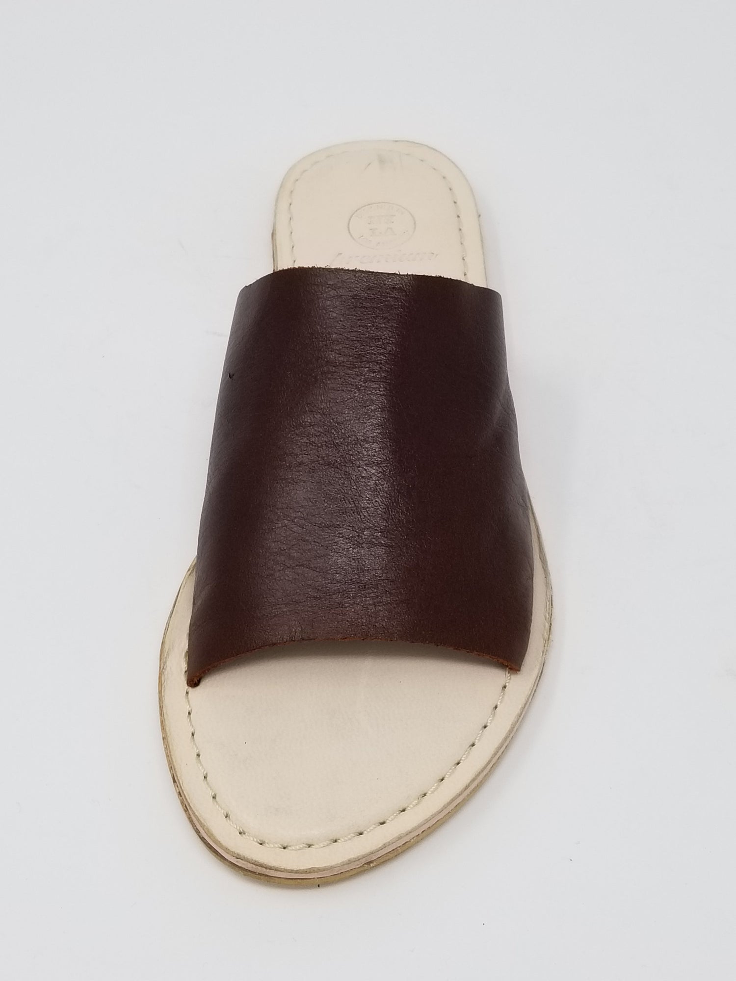 Front view of Azure Ophion Laguna whiskey-colored footwear showcasing stylish design and comfortable fit.