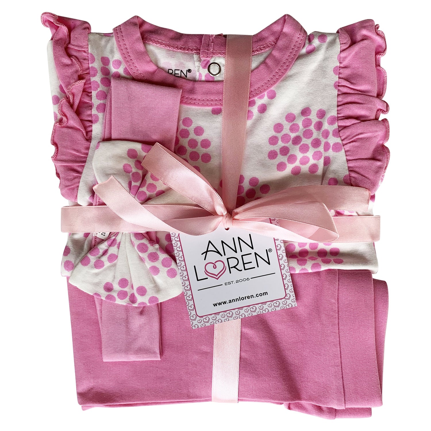 Baby girl in pink polka dot onesie, pants, and headband set by Black Simba, perfect for cozy, stylish kid&