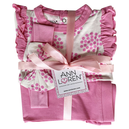 Baby girl in pink polka dot onesie, pants, and headband set by Black Simba, perfect for cozy, stylish kid&