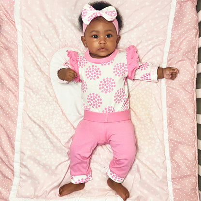 Black Simba baby girl pink polka dot layette set with onesie, pants, and headband, perfect for comfortable and adorable kid&