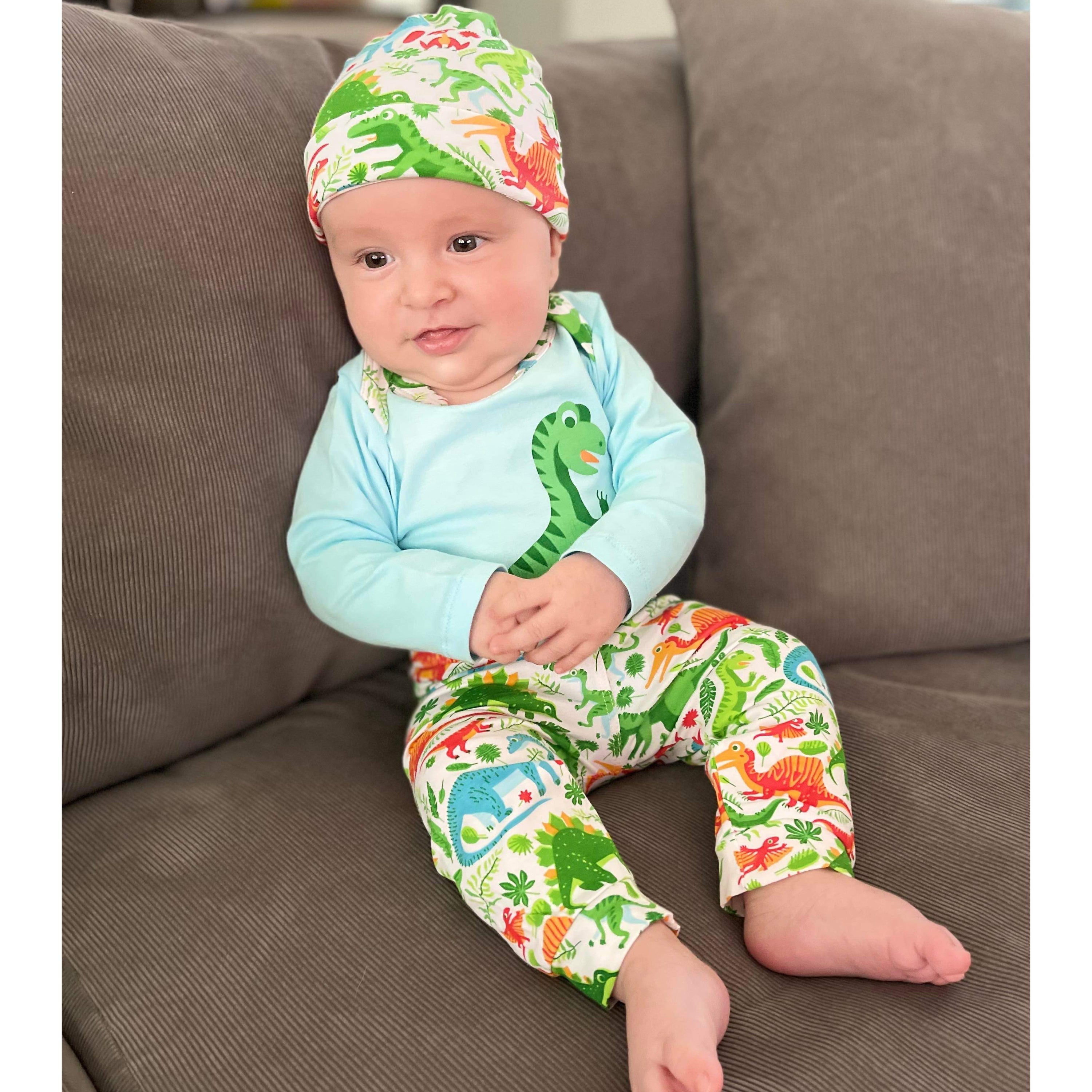 Black Simba AnnLoren baby boy dinosaur long sleeve onesie, pants, and cap set featuring playful dinosaur print and soft fabric.