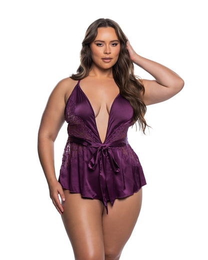 Brown Sooty Moonlight Kiss Romper for women, showing the stylish navy blue romper with floral pattern and adjustable straps.