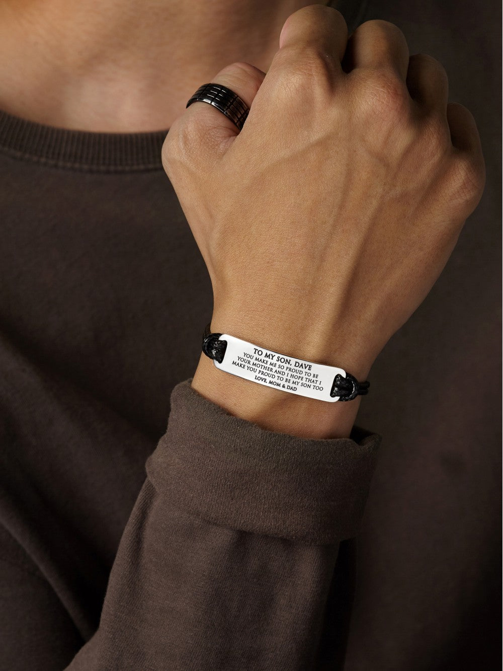 Personalized Green Millie bracelet for son, graduation gift from mom, featuring custom engraving on a stylish silver bracelet.