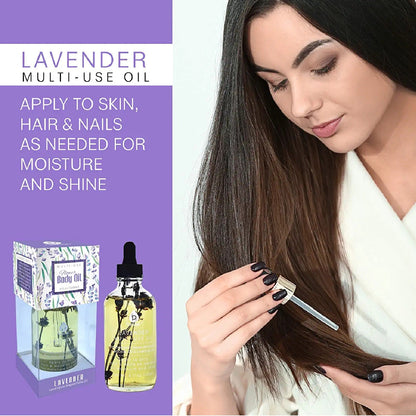 A 4 oz bottle of Blush Apollo lavender flower multi-use body oil with fresh lavender flowers and a clear glass container.