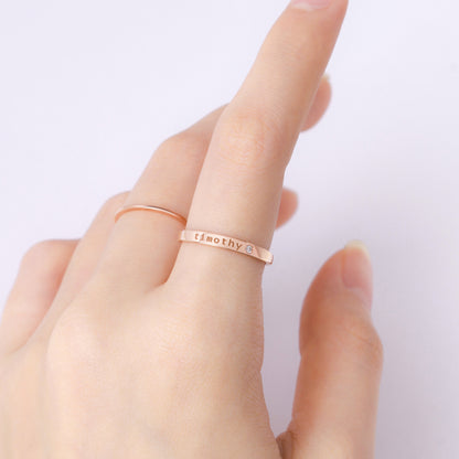 Personalized Green Millie name ring with embedded birthstone, stackable design, ideal for moms or personalized jewelry enthusiasts.