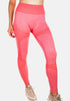 Pink Pear Juniper Leggings ICON for Damen, shown in orange front view with a fitted, comfortable design.