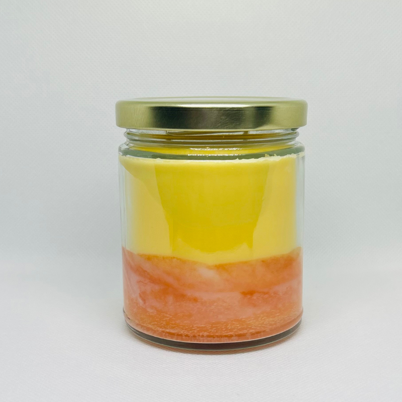 Bronze Alder Lemon Crumble diffuser oil bottle with lemon and crumble design, showcasing the product from the back.
