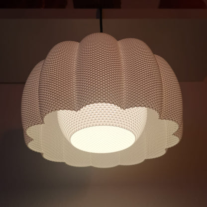 Azure Pontus Lotus Glow pendant lamp with a floral-inspired design, hanging light fixture in a modern lighting style.