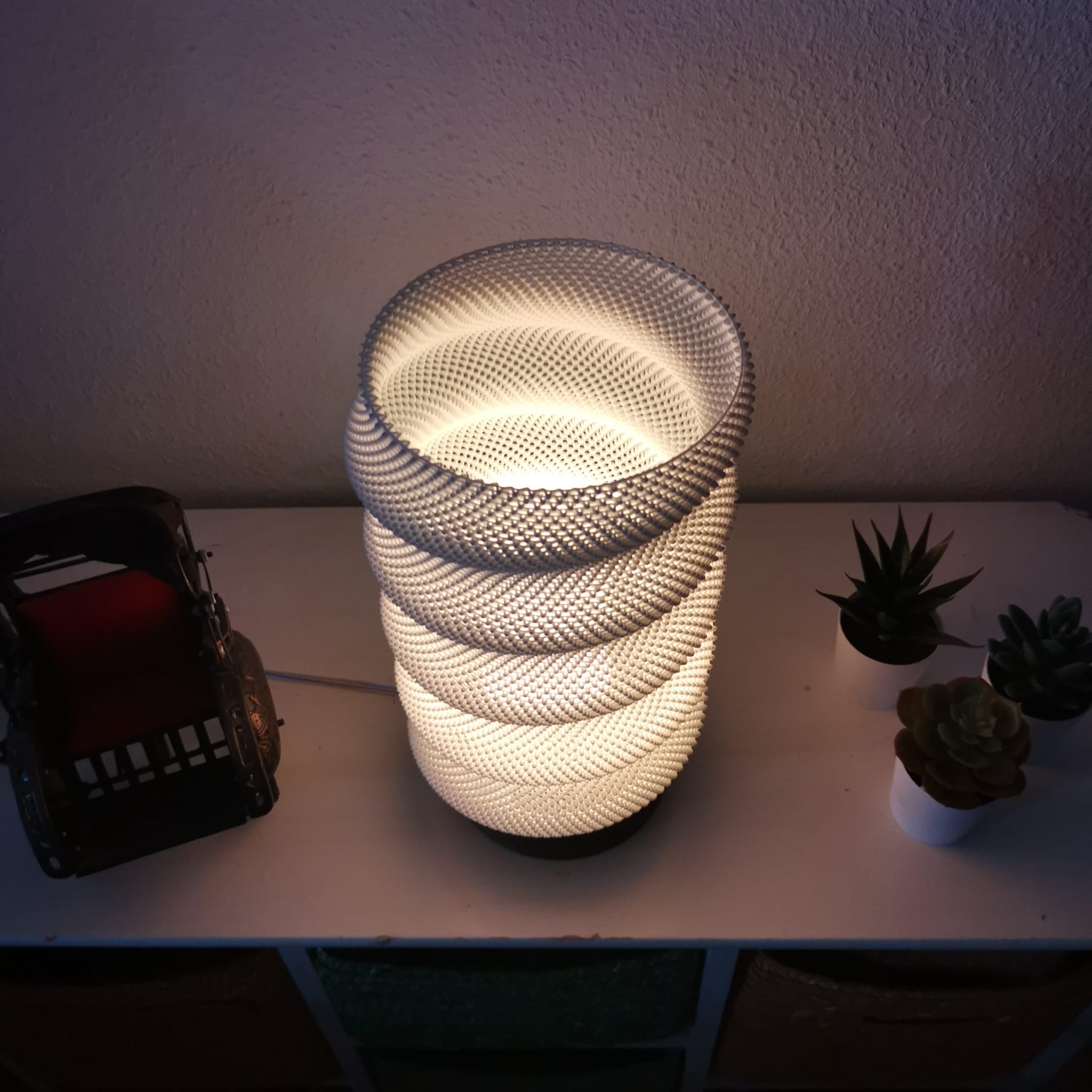 Azure Pontus Lumina Twist table lamp with a modern, sculptural design and adjustable light for stylish home lighting.