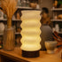 Azure Pontus Lumina Twist table lamp with sleek, modern design and twisting glass base, perfect for contemporary home lighting.