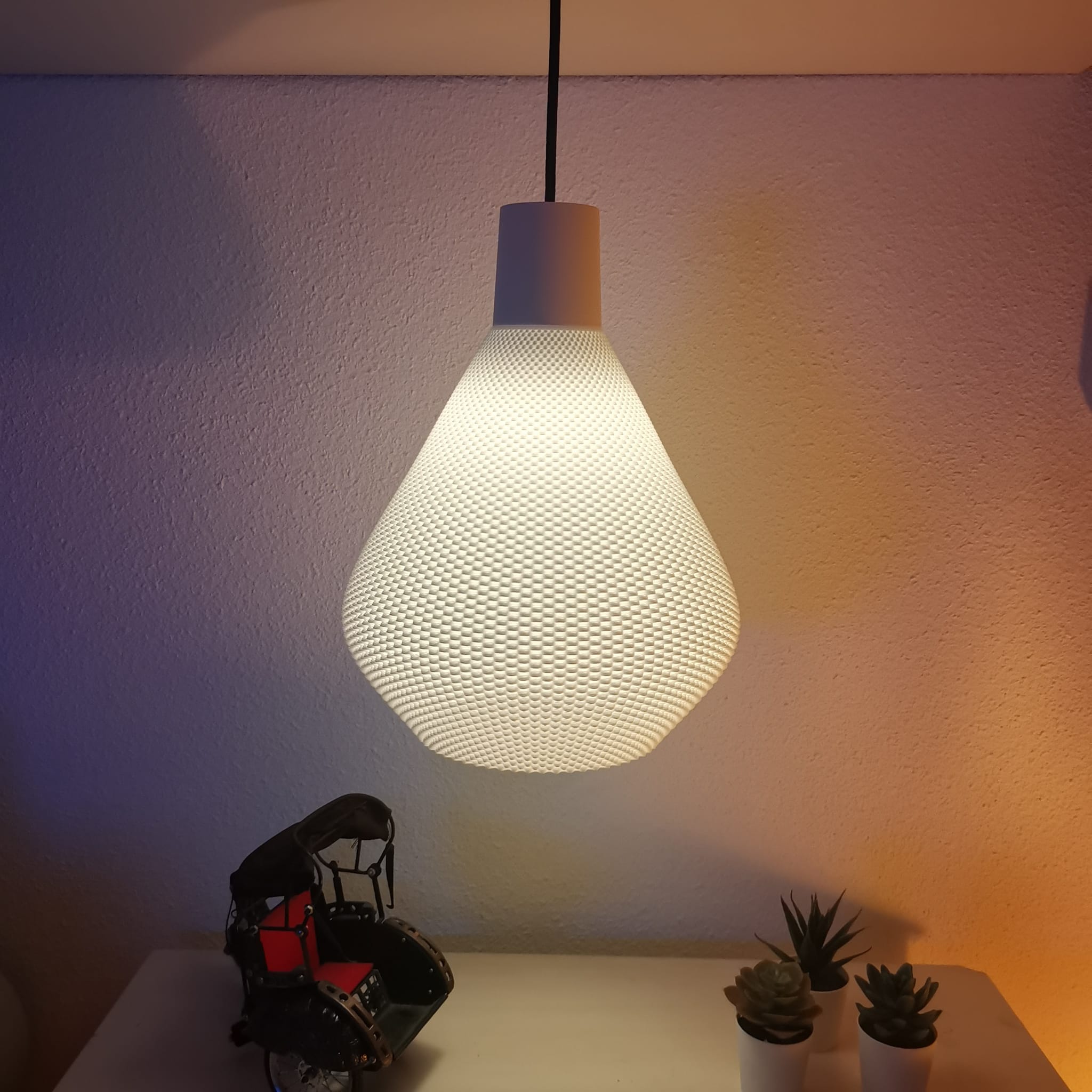 Azure Pontus Lumisera pendant lamp hanging fixture with a sleek, modern design and warm lighting for contemporary interiors.
