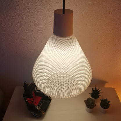 Azure Pontus Lumisera pendant lamp hanging with a sleek, modern design and a warm glow, ideal for contemporary interior lighting.