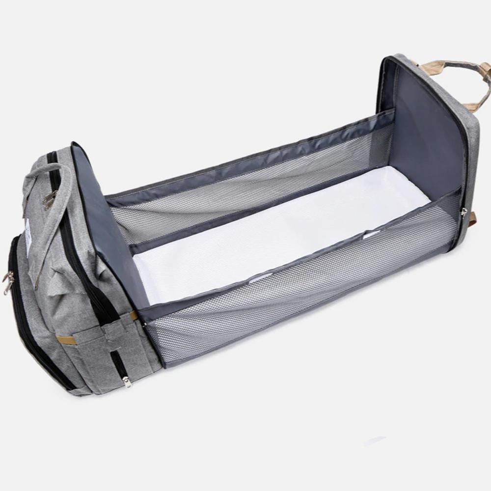 Yellow Pandora stroller diaper bag with built-in baby bed, spacious storage for parent and baby essentials.