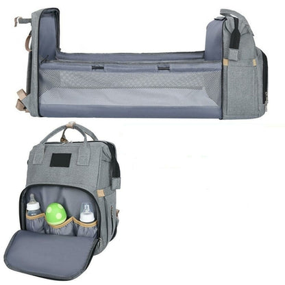Yellow Pandora stroller diaper bag with built-in baby bed, featuring multiple compartments and adjustable straps for parents on the go.