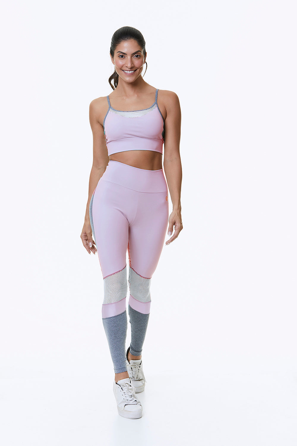 Women’s baby pink sports bra by Red Medusa, activewear, with supportive design and breathable fabric, shown on a plain background.