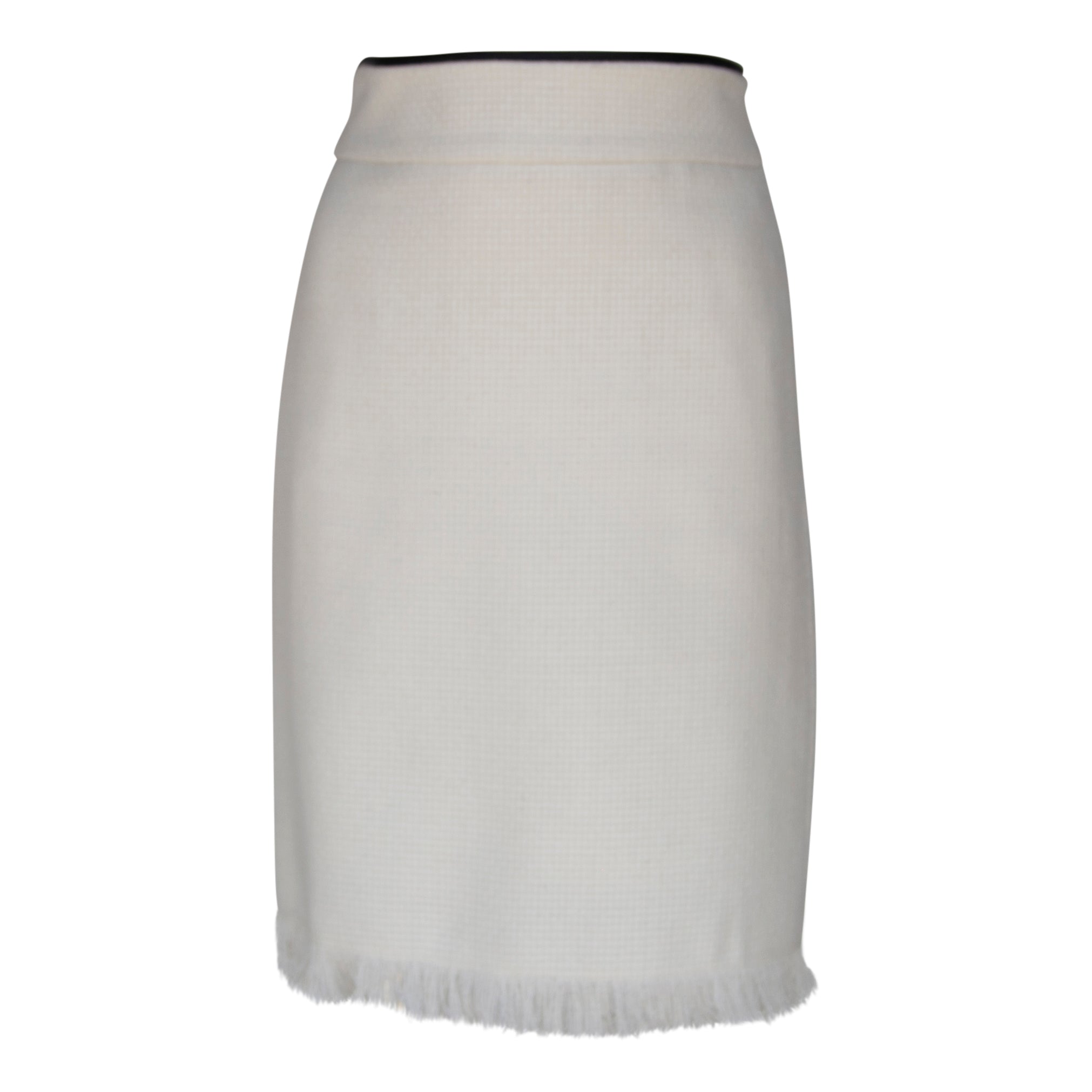 Luxe white mini tweed skirt for women by Mauve Daisy, showcasing a stylish, chic design with a textured tweed fabric.