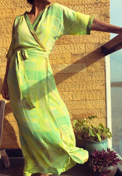 Violet Baobab Mia belted wrap dress with stylish accessories, featuring a flattering silhouette and elegant design.