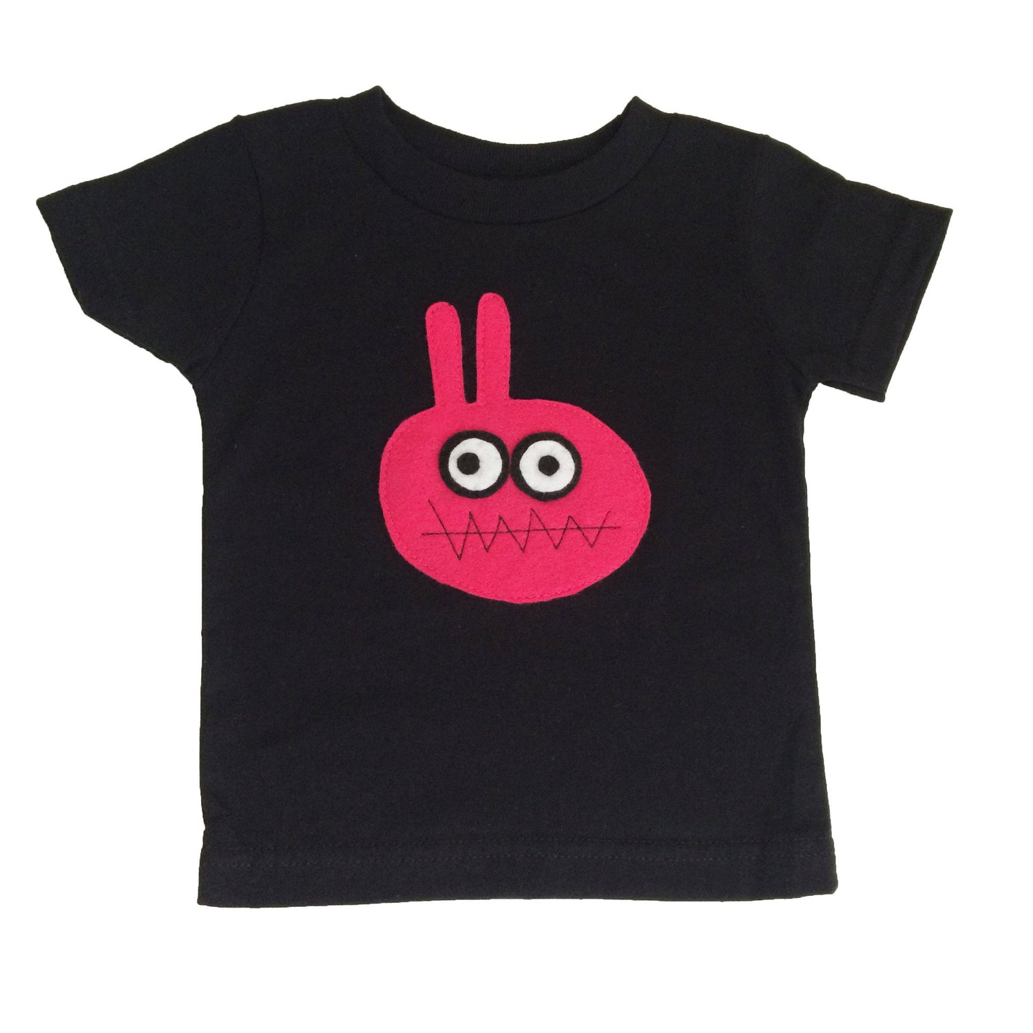 Kids T-shirt featuring a Bunny Monster design from the Sky Blue Milo collection, with a playful illustration on the front.
