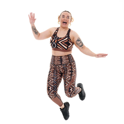 White Oliver Ibeekay Vibrant Activewear Leggings with bold colorful patterns, stretchy fabric, and a snug fit for workout or casual wear.