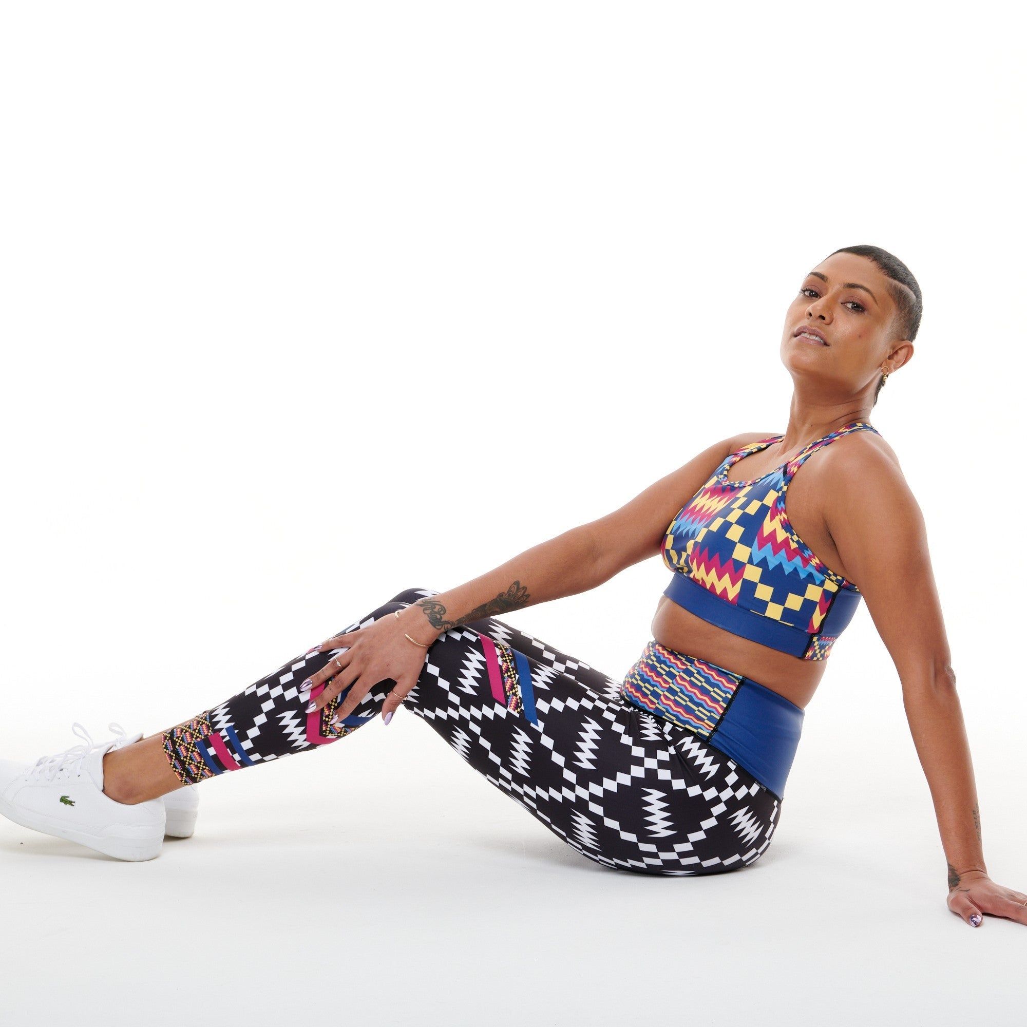 White Oliver Kayentee Cerulean Splash activewear leggings with vibrant blue and white watercolor print on stretchy fabric.