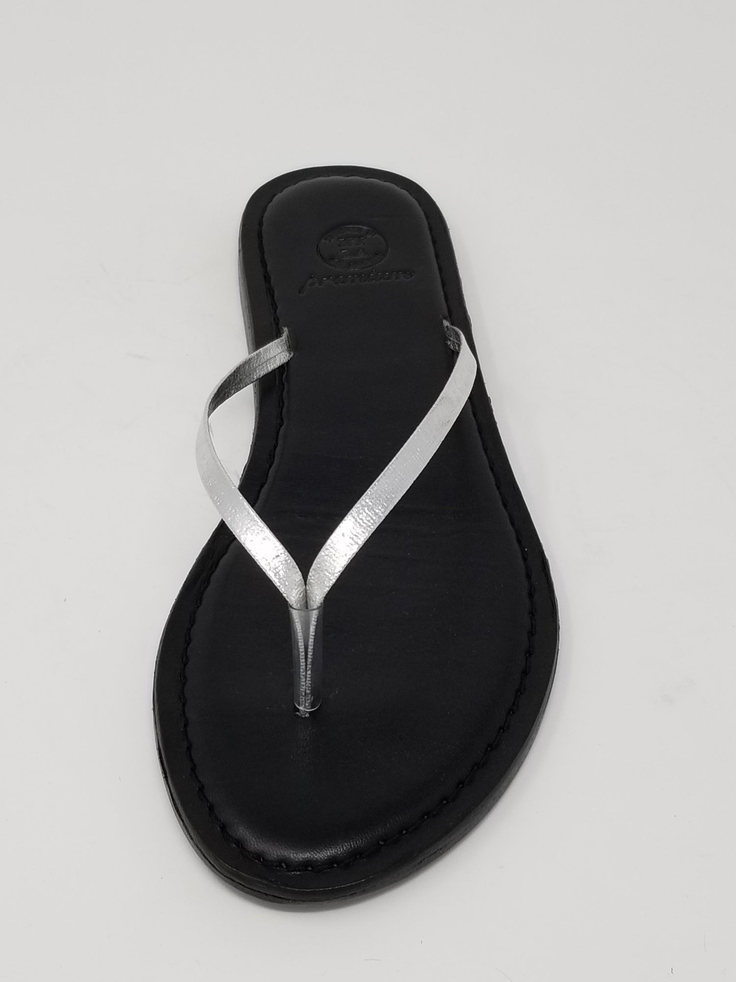 Azure Ophion Carmel footwear with a sleek silver front view, showcasing stylish design and modern craftsmanship.