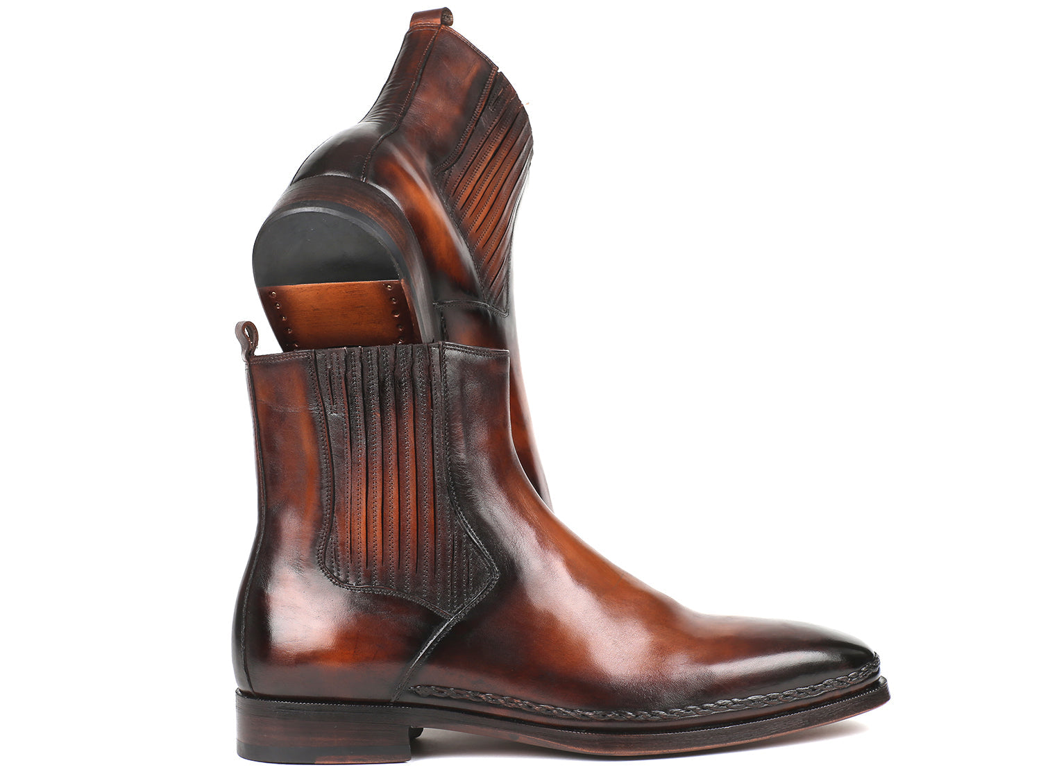 Brown burnished leather Paul Parkman Chelsea boots by Ruby Ophion, featuring classic ankle-high design and elastic side panels.