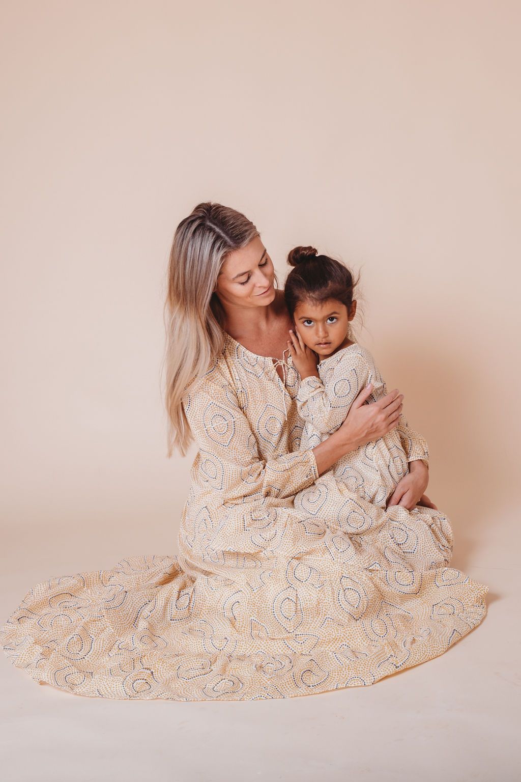 Colorful block printed girl’s Kaftan dress by Ivory Meleager featuring traditional motifs, perfect for casual or festive wear.