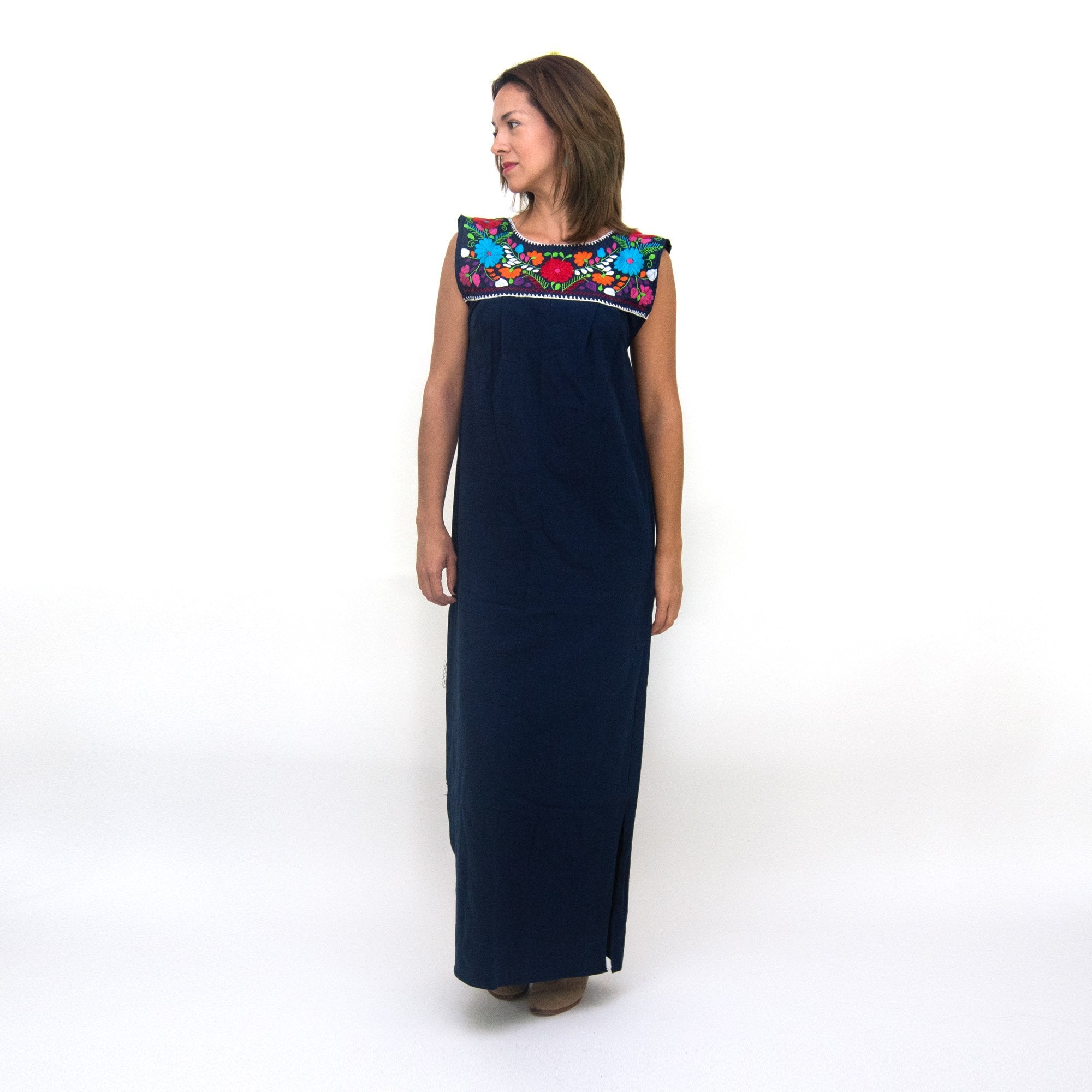 Hand-embroidered Maxi Isidra loose Mexican dress for women, featuring detailed embroidery and flowing fabric, by Violet Athena.