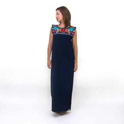 Hand-embroidered Maxi Isidra loose Mexican dress for women, featuring detailed embroidery and flowing fabric, by Violet Athena.