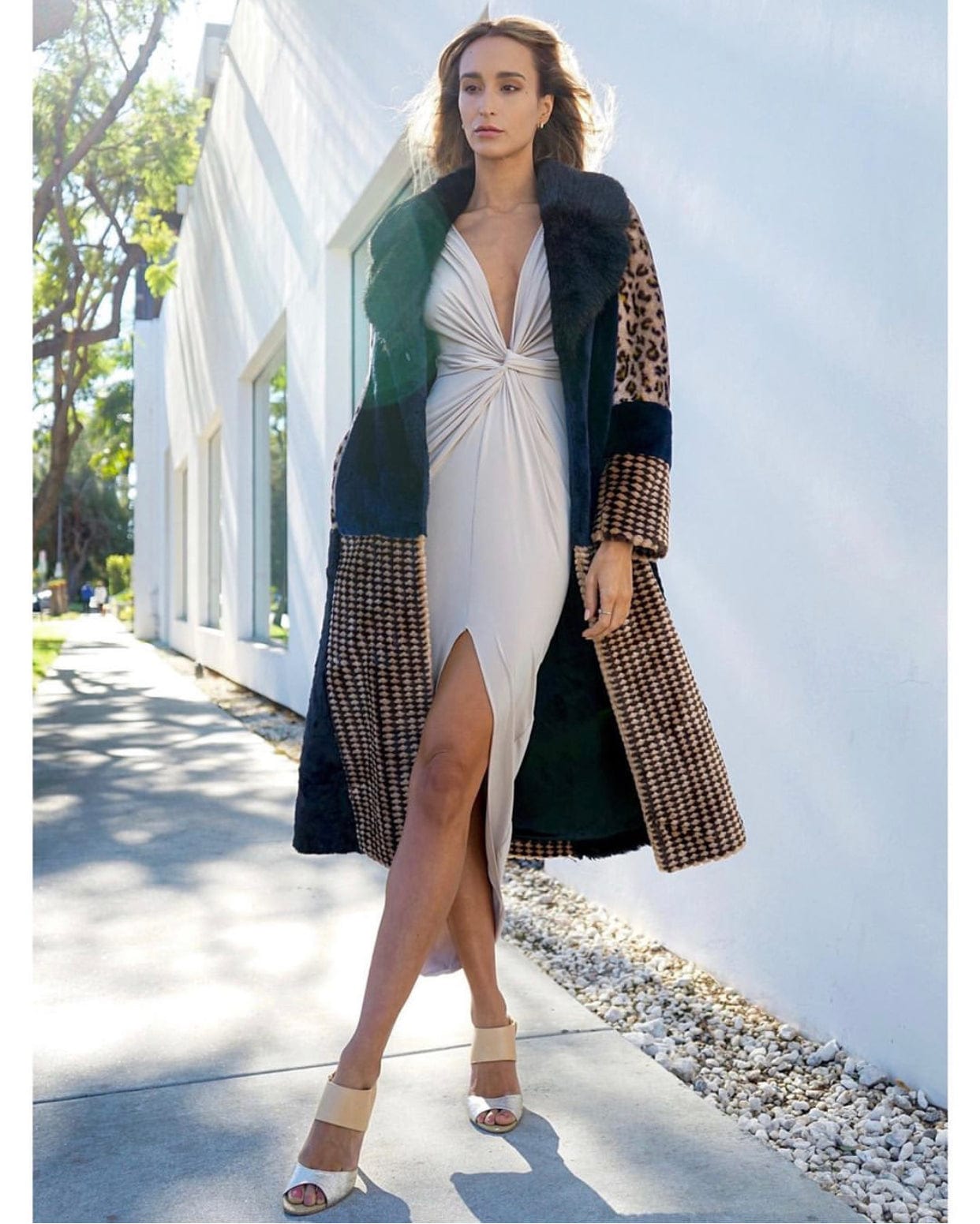 Nude low cut midi dress by Blush Athena featuring a sleek, fitted silhouette and elegant design, worn by model.
