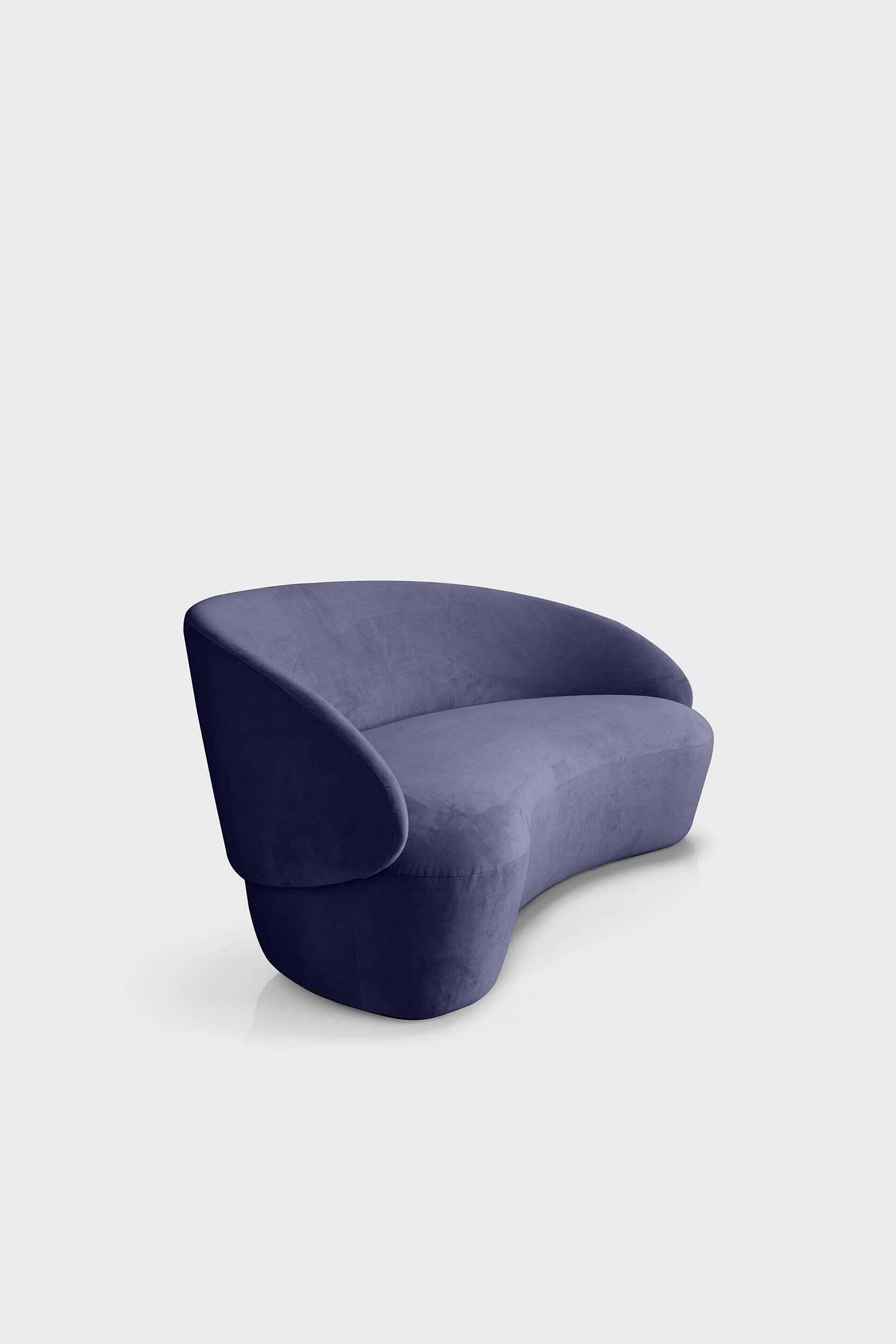 Naïve Sofa by Aquamarine Poppy, modern furniture with plush cushions and sleek design, shown in a cozy living room setting.